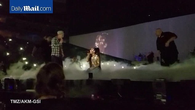 Ariana Grande is Creeperd on By a Male Fan on Stage | CelebNews image 1